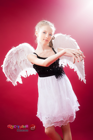 Фотосессия девушки с крыльями ангела